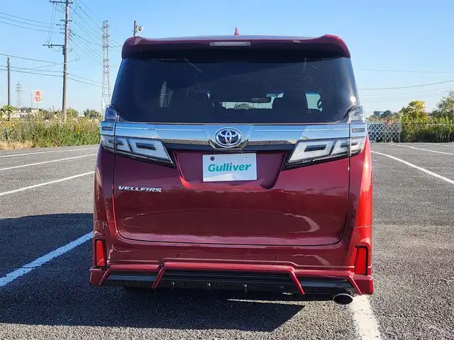 トヨタ ヴェルファイア Z Aエディション 群馬県 2018(平30)年 1.8万km ダークレッドマイカメタリック 純正10型ナビ/フルセグTV/純正12.1型後席ディスプレイ/両側パワースライドドア/バックモニター/ビルトインETC2.0/ドライブレコーダー/レーダークルーズコントロール/クリアランスソナー/セーフティセンス/・衝突被害軽減ブレーキ/・車線逸脱防止支援/・標識認識/・オートマチックハイビーム/2眼LEDヘッドランプ/デュアルオートエアコン/革巻きステアリング/2列目リラックスキャプテンシート/助手席・2列目オットマン/純正18インチアルミホイール/スマートキー/プッシュエンジンスタート/禁煙車