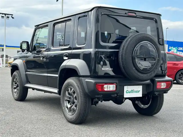 スズキ ジムニー ノマド FC 長崎県 2025(令7)年 0.1万km 黒 車体色：【WB3】ブルーイッシュブラックパール/ワンオーナー/ALPINE11インチディスプレイオーディオ/　(BT/FM/AM/AppleCarPlay/AndroidAuto)/プッシュスタート/スマートキー/ステアリングスイッチ/アダプティブクルーズコントロール/アイドリングストップ/ヘッドライトウォッシャー/光軸調整ダイヤル/純正15インチアルミホイール/純正フロアマット/背面タイヤ/スズキセーフティサポート/ABS/レーンキープアシスト/衝突被害軽減ブレーキ/パーキングソナー/オートライト/横滑り防止装置/ヒルディセントコントロール/取扱説明書/保証書/スペアキー(1本)