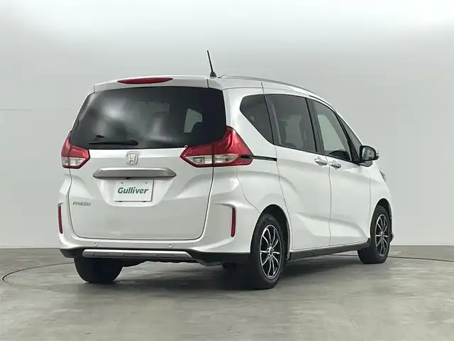 ホンダ フリード クロスター 福島県 2023(令5)年 4.1万km プラチナホワイトパール ホンダセンシング　/・衝突軽減ブレーキ　/・クルーズコントロール　/・路外逸脱抑制機能/・歩行者事故低減ステアリング/・先行車発進お知らせ/純正ナビゲーション/・型式：CN-HE02D/・Bluetooth/TV/CD/DVD/AM・FM/SD/USB/。バックカメラ/・ETC/前後ドライブレコーダー/両側パワースライドドア/革巻きステアリング/・ステアリングスイッチ/シートヒーター/プッシュスタート/・スマートキー/LEDライト/・フォグライト/・オートライト/純正フロアマット