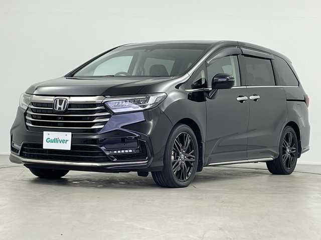 ホンダ オデッセイ ハイブリッド e:HEVアブソルート EX 岐阜県 2020(令2)年 4.9万km プレミアムスパークルブラックパール 純正10インチインターナビ/・フルセグ/BT/CD/DVD/HDMI/マルチビューモニター/フリップダウンモニター/前後ドライブレコーダー/両側パワースライドドア/パワーバックドア/ETC2.0/ハーフレザーシート/・パワーシート/・オットマン/ホンダセンシング/・衝突軽減ブレーキ/・誤発進抑制機能(前方・後方)/・近距離衝突軽減ブレーキ/・急アクセル抑制機能/・路外逸脱抑制機能/・歩行者事故低減ステアリング/・車線維持支援システム/・標識認識機能/・先行車発進お知らせ機能/・渋滞追従機能付きアダプティブクルーズコントロール/・ブラインドスポットインフォメーション/LEDヘッドライト/・フォグランプ/プッシュスタート/スマートキー/純正フロアマット/純正ドアバイザー