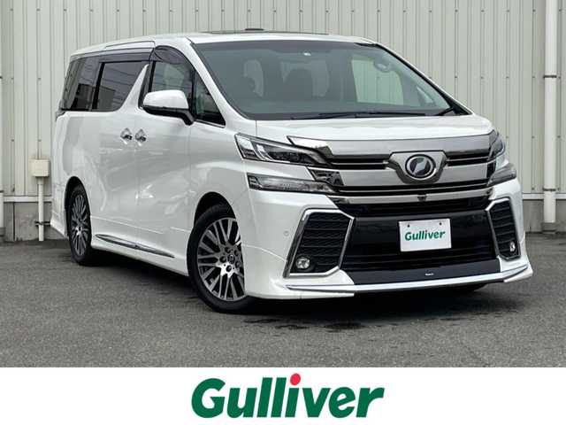 トヨタ ヴェルファイア Z Gエディション 山形県 2016(平28)年 7.3万km ホワイトパールクリスタルシャイン サンルーフ/JBLプレミアムサウンドシステム/純正SDナビ/　　【CD DVD BD BT フルセグ USB AUX】/全周囲カメラ/両側パワースライドドア/電動リアゲート/レーダークルーズコントロール/LEDオートヘッドライト/レザーシート/パワーシート/シートヒーター/オットマン/モデリスタエアロ/純正18インチアルミホイール/アイドリングストップ/コーナーセンサー/ステアリングスイッチ/MTモード付AT/電動格納ウィンカーミラー/フォグランプ/スマートキー/ETC