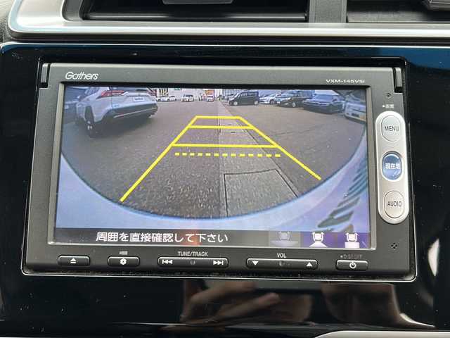 ホンダ フィット ハイブリット Lパッケージ 石川県 2013(平25)年 7万km プレミアムホワイトパール スマートキー/プッシュスタート/純正ナビ/ワンセグＴＶ　/Bluetooth/DVD再生/バックカメラ/ハーフレザー/ＬＥＤヘッドライト/ＥＴＣ/クルーズコントロール/１５インチアルミ