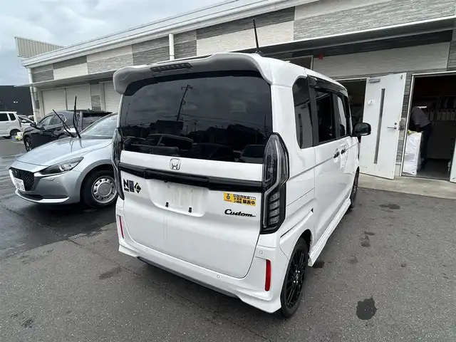 ホンダ Ｎ ＢＯＸ カスタム L ターボ スタイル+ブラック 茨城県 2022(令4)年 0.7万km プラチナホワイトパール プッシュスタート/スマートキー/アイドリングストップ/クルーズコントロール/純正ナビ/Bluetooth/前後ドラレコ/前席シートヒーター/両側パワースライドドア/純正フロアマット/コーナーセンサー/オートマチックハイビーム
