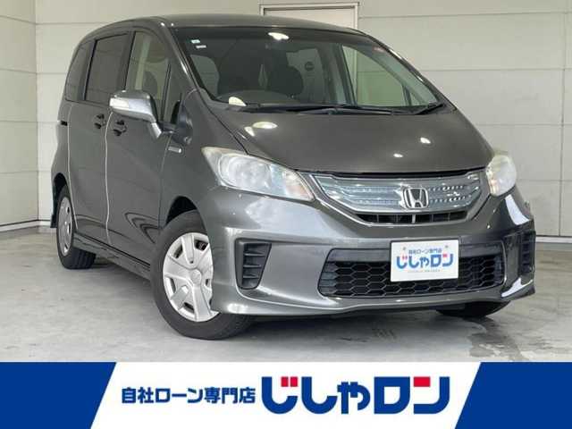 ホンダ フリード ハイブリット ジャストセレクション 沖縄県 2013(平25)年 6.4万km ポリッシュドメタルメタリック (株)IDOMが運営する【じしゃロンコザ店】の自社ローン専用車両になりますこちらは現金またはオートローンご利用時の価格です。自社ローンご希望の方は別途その旨お申付け下さい/・純正ナビ/・バックカメラ/・Ｂｌｕｅｔｏｏｔｈ接続/・ＤＶＤ再生/・ＴＶ/・片側パワースライドドア/・スマートキー/・ETC/・クルーズコントロール/・純正フロアマット/・オートライト