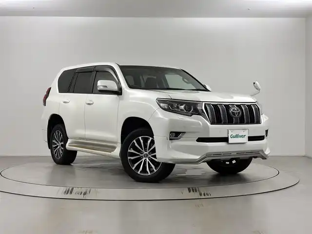 トヨタ ランドクルーザー プラド TX Lパッケージ 埼玉県 2018(平30)年 3.8万km ホワイトパールクリスタルシャイン 純正エアロ/サンルーフ　/純正ナビ　/(フルセグ/AM/FM/Bluetooth)　/ビルトインＥＴＣ　/バックカメラ　/前方ドライブレコーダー　/純正フロアマット　/シートヒーター(Ｄ＋Ｎ席)/エアシート(Ｄ＋Ｎ席)/パワーシート(Ｄ＋Ｎ席)　/純正ＡＷ１９インチ/レーンディパーチャーアラート/プリクラッシュセーフティ