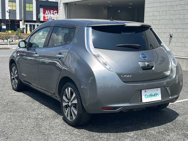 日産 リーフ X 千葉県 2015(平27)年 10.7万km ダークメタルグレー 国産EV車/純正SDナビ/エンジンスタートボタン/バックカメラ/BlueTooth接続/ステアリングスイッチ/LEDヘッドライト/ドライブレコーダー（型番:DRY-ST5000）/フルセグTV/iPod接続/スマートキー/スペアキー（１本）/純正アルミホイール/純正マット/ETC/オートライト/シートヒーター/エアシート/保証書/取扱説明書