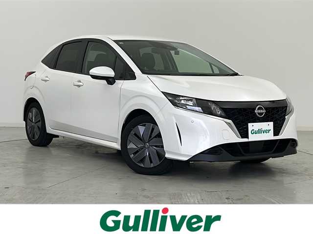 日産 ノート X FOUR 宮城県 2022(令4)年 4.4万km ピュアホワイトパール エマージェンシーブレーキ/車線逸脱警報/アダプティブヘッドライト/ソナー/社外7インチSDナビ/・BT.USB.AUX.SD.CD.DVD/バックカメラ/前席シートヒーター/ステアリングスイッチ/ステアリングヒーター/ETC/ドライブレコーダー（F）/プッシュスタート/スマートキー×2/電動パーキングブレーキ/横滑り防止装置/社外フロアマット/純正16インチホイルキャップ/ヘッドライト