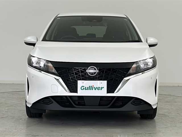 日産 ノート X FOUR 宮城県 2022(令4)年 4.4万km ピュアホワイトパール エマージェンシーブレーキ/車線逸脱警報/アダプティブヘッドライト/ソナー/社外7インチSDナビ/・BT.USB.AUX.SD.CD.DVD/バックカメラ/前席シートヒーター/ステアリングスイッチ/ステアリングヒーター/ETC/ドライブレコーダー（F）/プッシュスタート/スマートキー×2/電動パーキングブレーキ/横滑り防止装置/社外フロアマット/純正16インチホイルキャップ/ヘッドライト