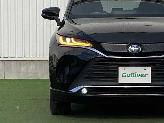トヨタ ハリアー ハイブリッド G レザーパッケージ 香川県 2021(令3)年 3.5万km プレシャスブラックパール 登録時走行距離：34970km/メーカー純正ナビ/　BT接続/バックカメラ/プリクラッシュセーフティシステム/レーンキープアシスト/レーダークルーズコントロール/クリアランスソナー/オートハイビーム/LEDヘッドライト/オートライト/フォグランプ/デジタルインナーミラー/ビルトインETC/MTモード付AT/電子パーキングブレーキ/ブラックレザーシート/シートベンチレーション/パワーシート/シートメモリ/プッシュスタート/スマートキー/スペアキー