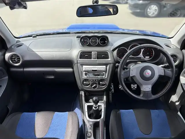 スバル インプレッサ ＷＲＸ STi 東京都 2003(平15)年 6.2万km WRブルーマイカ 純正BBS製17インチアルミ/STI製ストラットタワーバー/STI製３蓮メーター/TEIN製車高調キット/トラスト製マフラー/ブリッツ製エアクリーナー/ブリッツ製インタークーラー/ブリッツ製ラジエター/ないる屋製Frバンパー/ないる屋製サイドステップ/ないる屋製Frフェンダー/ないる屋製ボンネット/純正DVDナビ/ETC/純正フロアマット/HIDヘッドライト/保証書/整備記録簿/取扱説明書