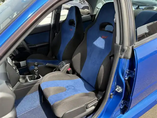 スバル インプレッサ ＷＲＸ STi 東京都 2003(平15)年 6.2万km WRブルーマイカ 純正BBS製17インチアルミ/STI製ストラットタワーバー/STI製３蓮メーター/TEIN製車高調キット/トラスト製マフラー/ブリッツ製エアクリーナー/ブリッツ製インタークーラー/ブリッツ製ラジエター/ないる屋製Frバンパー/ないる屋製サイドステップ/ないる屋製Frフェンダー/ないる屋製ボンネット/純正DVDナビ/ETC/純正フロアマット/HIDヘッドライト/保証書/整備記録簿/取扱説明書