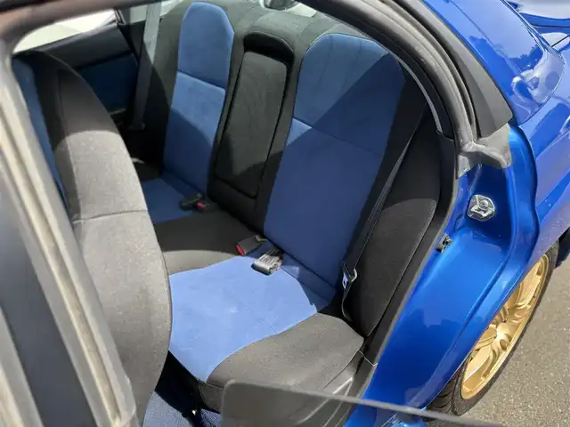スバル インプレッサ ＷＲＸ STi 東京都 2003(平15)年 6.2万km WRブルーマイカ 純正BBS製17インチアルミ/STI製ストラットタワーバー/STI製３蓮メーター/TEIN製車高調キット/トラスト製マフラー/ブリッツ製エアクリーナー/ブリッツ製インタークーラー/ブリッツ製ラジエター/ないる屋製Frバンパー/ないる屋製サイドステップ/ないる屋製Frフェンダー/ないる屋製ボンネット/純正DVDナビ/ETC/純正フロアマット/HIDヘッドライト/保証書/整備記録簿/取扱説明書