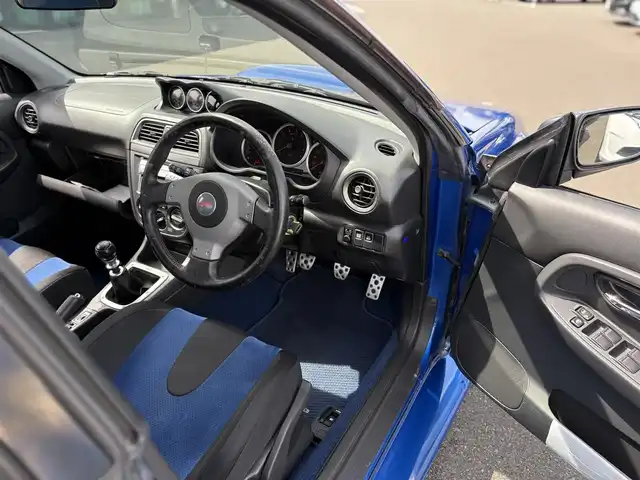 スバル インプレッサ ＷＲＸ STi 東京都 2003(平15)年 6.2万km WRブルーマイカ 純正BBS製17インチアルミ/STI製ストラットタワーバー/STI製３蓮メーター/TEIN製車高調キット/トラスト製マフラー/ブリッツ製エアクリーナー/ブリッツ製インタークーラー/ブリッツ製ラジエター/ないる屋製Frバンパー/ないる屋製サイドステップ/ないる屋製Frフェンダー/ないる屋製ボンネット/純正DVDナビ/ETC/純正フロアマット/HIDヘッドライト/保証書/整備記録簿/取扱説明書