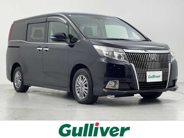 トヨタ エスクァイア Gi 愛知県 2016(平28)年 5万km スパークリングブラックパールクリスタルシャイン 9インチ純正ナビ（NSZT-Y66T）/・Ｂｌｕｅｔｏｏｔｈ接続/・フルセグ/・CD/DVD/アルパイン後席モニター/クルーズコントロール/ビルトインＥＴＣ/バックカメラ/合皮シート/前席シートヒーター/両側パワースライドドア/レーンキープアシスト/純正アルミホイール/レーンキープアシスト/HIDオートライト/オートハイビーム/衝突被害軽減/フォグランプ
