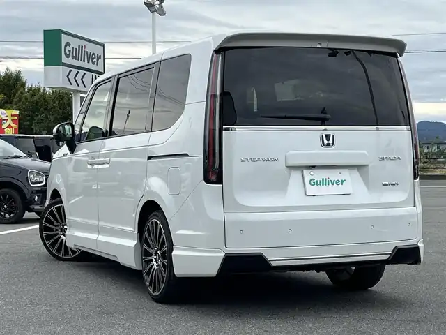 ホンダ ステップワゴン スパーダ eHEV 奈良県 2022(令4)年 2.7万km プラチナホワイトパール 無限フルエアロ/無限フロントグリル/純正ナビ（LXM-237VFNi)/（TV/BT/CD/DVD/AppleCarPlay/AndroidAuto)/純正10インチフリップダウンモニター（VM-221T）/レーダークルーズコントロール/バックカメラ/パドルシフト/ブラインドスポットモニター/前後コーナーセンサー/衝突軽減システム/レーンキープアシスト/両側パワースライドドア/パワーバックドア/ハーフレザーシート/前席シートヒーター/後席サンシェード/純正前方ドライブレコーダー/ETC/無限19インチＡＷ/スペアキーＸ１