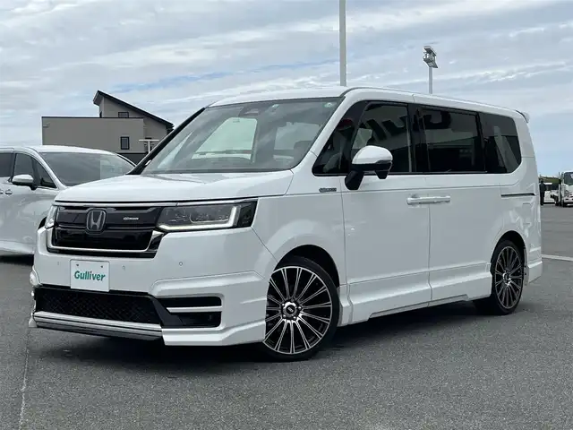 ホンダ ステップワゴン スパーダ eHEV 奈良県 2022(令4)年 2.7万km プラチナホワイトパール 無限フルエアロ/無限フロントグリル/純正ナビ（LXM-237VFNi)/（TV/BT/CD/DVD/AppleCarPlay/AndroidAuto)/純正10インチフリップダウンモニター（VM-221T）/レーダークルーズコントロール/バックカメラ/パドルシフト/ブラインドスポットモニター/前後コーナーセンサー/衝突軽減システム/レーンキープアシスト/両側パワースライドドア/パワーバックドア/ハーフレザーシート/前席シートヒーター/後席サンシェード/純正前方ドライブレコーダー/ETC/無限19インチＡＷ/スペアキーＸ１