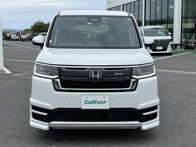 ホンダ ステップワゴン スパーダ eHEV 奈良県 2022(令4)年 2.7万km プラチナホワイトパール 無限フルエアロ/無限フロントグリル/純正ナビ（LXM-237VFNi)/（TV/BT/CD/DVD/AppleCarPlay/AndroidAuto)/純正10インチフリップダウンモニター（VM-221T）/レーダークルーズコントロール/バックカメラ/パドルシフト/ブラインドスポットモニター/前後コーナーセンサー/衝突軽減システム/レーンキープアシスト/両側パワースライドドア/パワーバックドア/ハーフレザーシート/前席シートヒーター/後席サンシェード/純正前方ドライブレコーダー/ETC/無限19インチＡＷ/スペアキーＸ１