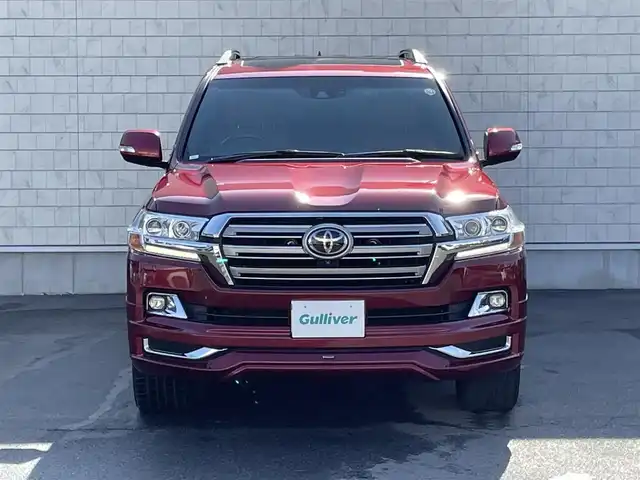 トヨタ ランドクルーザー ZX 群馬県 2017(平29)年 4.2万km ダークレッドマイカメタリック ワンオーナー/純正SDナビ/モデリスタフルエアロ/パーキングソナー/アダプティブクルーズコントロール/電動格納ミラー/本革+木目調ステアリング/木目調内装/シートセットポジションメモリー/Bluetooth/ステアリングスイッチ/ステアリングヒーター/ヘッドレストモニター/前席パワーシート/2列目前後パワーシート/LEDフォグランプ/LEDヘッドライト/V8/全周囲カメラ/AHB/純正20インチアルミホイール/純正フロアマット/前方ドライブレコーダー/サンルーフ/パワーステアリング/チップアップシート/純正ビルトインETC2.0/ルーフレール/スマートキー