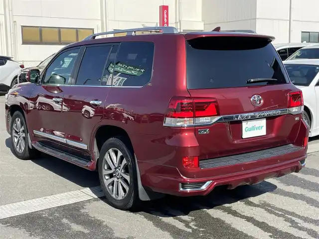 トヨタ ランドクルーザー ZX 群馬県 2017(平29)年 4.2万km ダークレッドマイカメタリック ワンオーナー/純正SDナビ/モデリスタフルエアロ/パーキングソナー/アダプティブクルーズコントロール/電動格納ミラー/本革+木目調ステアリング/木目調内装/シートセットポジションメモリー/Bluetooth/ステアリングスイッチ/ステアリングヒーター/ヘッドレストモニター/前席パワーシート/2列目前後パワーシート/LEDフォグランプ/LEDヘッドライト/V8/全周囲カメラ/AHB/純正20インチアルミホイール/純正フロアマット/前方ドライブレコーダー/サンルーフ/パワーステアリング/チップアップシート/純正ビルトインETC2.0/ルーフレール/スマートキー