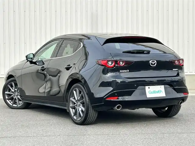 マツダ マツダ３ファストバック 15S ツーリング 群馬県 2023(令5)年 4.7万km ジェットブラックマイカ 純正ディスプレイオーディオ/（FM/AM/CD/DVD/HDMI/Bluetooth/フルセグTV）/全方位カメラ/前後ドラレコ（C9KA V6 580A）/ETC/ワンオーナー/i-ACTIVSENSE/・追従走行式クルーズコントロール/・レーンキープアシスト/・LEDヘッドライト/・オートライト/・オートハイビーム/・衝突被害軽減装置/純正フロアマット/純正18インチAW/ステアリングスイッチ/革巻きステアリング/電動格納ミラー/取扱説明書