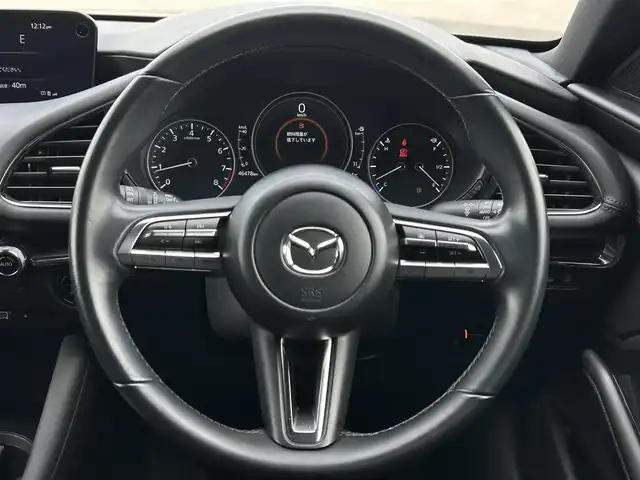 マツダ マツダ３ファストバック 15S ツーリング 群馬県 2023(令5)年 4.7万km ジェットブラックマイカ 純正ディスプレイオーディオ/（FM/AM/CD/DVD/HDMI/Bluetooth/フルセグTV）/全方位カメラ/前後ドラレコ（C9KA V6 580A）/ETC/ワンオーナー/i-ACTIVSENSE/・追従走行式クルーズコントロール/・レーンキープアシスト/・LEDヘッドライト/・オートライト/・オートハイビーム/・衝突被害軽減装置/純正フロアマット/純正18インチAW/ステアリングスイッチ/革巻きステアリング/電動格納ミラー/取扱説明書