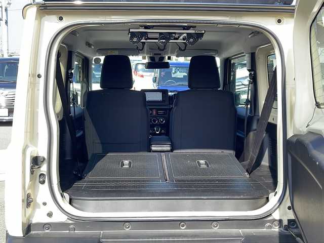 スズキ ジムニー XC 徳島県 2023(令5)年 2.4万km シフォンアイボリーメタリックブラック2トーンルーフ パナソニックナビ　CN-HE02WD/(AM.FM.CD.DVD.BT.フルセグ)/ルーフキャリア/前席シートヒーター/ステアリングスイッチ/ヘッドライトウォッシャー/バックカメラ/ビルトインETC/LEDヘッドライト