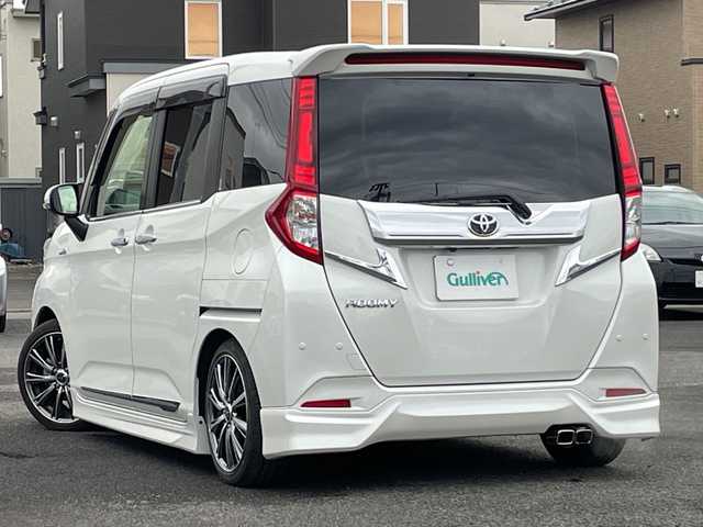 トヨタ ルーミー カスタムG 道央・札幌 2020(令2)年 7.6万km パールホワイトⅢ ４WD/寒冷地仕様/純正SDナビ/AM/FM/BT/SD/CD/フルセグ/衝突被害軽減ブレーキ/横滑り防止装置/クルーズコントロール/クリアランスソナー/バックカメラ/サイドカメラ/フロントカメラ/全方位カメラ/アラウンドビューモニター/ビルトインETC/ドライブレコーダー/アイドリングストップ/ワイパーデアイサー/両側パワースライドドア/革巻きステアリング/ステアリングリモコン/プッシュスタート/スマートキー/LEDヘッドライト/オートライト/オートマチックハイビーム/フォグランプ/電動格納ミラー/ウィンカーミラー/社外フロアマット/ドアバイザー/モデリスタフルエアロ/社外AW冬タイヤ積込/165/65/R14/2019年/山6mm/純正AW夏タイヤ積込/165/65/R14/2019年/山4mm