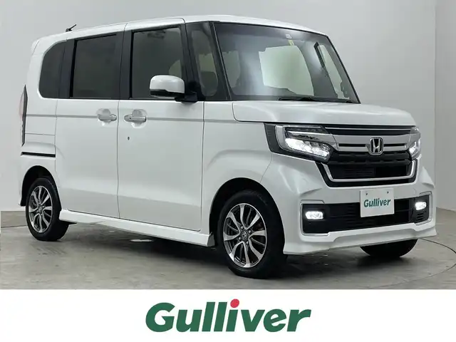 ホンダ Ｎ ＢＯＸ カスタム L 埼玉県 2022(令4)年 2.8万km プラチナホワイトパール ４ＷＤ　純正メモリナビ　ＢＴ　ＣＤ　ＤＶＤ　ＳＤ　ｉＰｏｄ　フルセグＴＶ　バックカメラ　シートヒーター　追従クルコン　スマートキー　衝突軽減　横滑り防止装置　レーンキープ　オートライト　ＬＥＤ　ＡＢＳ