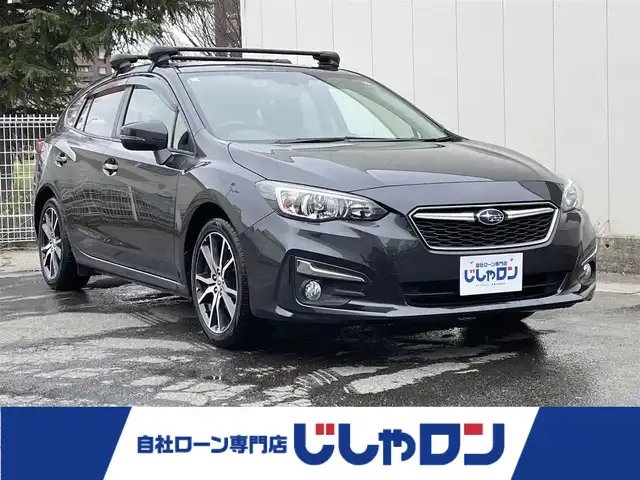 スバル インプレッサ スポーツ 2．0i－Lアイサイト 福島県 2018(平30)年 12.9万km ダークグレーメタリック (株)IDOMが運営する【じしゃロン福島店】の自社ローン専用車両になります。こちらは現金またはオートローンご利用時の価格です。自社ローンご希望の方は別途その旨お申付け下さい/カロッツェリアナビ/フルセグテレビ/クルーズコントロール/パドルシフト/ステアリングリモコン/革巻ステアリング/アイサイト/パドルシフト/ヒルスタートアシスト/ルーフキャリアバー/ウィンカーミラー