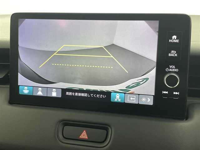ホンダ ヴェゼル ハイブリッド e:HEV Z 熊本県 2025(令7)年 0.1万km未満 クリスタルブラックパール 登録済未使用車/純正ナビ（ＡｐｐｌＣａｒＰｌａｙ・ＡｎｄｒｏｉｄＡｕｔｏ・ＵＳＢ・ＢＴ・フルセグ）/ビルトインＥＴＣ２．０　/前後クリアランスソナー　/ホンダセンシング/・衝突軽減ブレーキ/・踏み間違い防止/・急アクセル抑制機能/・路外逸脱抑制機能/・歩行者事故低減ステアリング/・アダブティブクルーズコントロール/・車線維持支援システム/・先行車発進お知らせ/・標識認識システム/・ブラインドスポットモニター/・オートマチックハイビーム/ダウンヒルアシスト/横滑り防止/パワーバックドア/前席シートヒーター/ステアリングヒーター/置くだけ充電/パドルシフト/ハーフレザーシート/純正１８インチAW/オートライト/LEDヘッドライト/フォグライト/スマートキー/プッシュスタート/スペアキー1本/取扱説明書