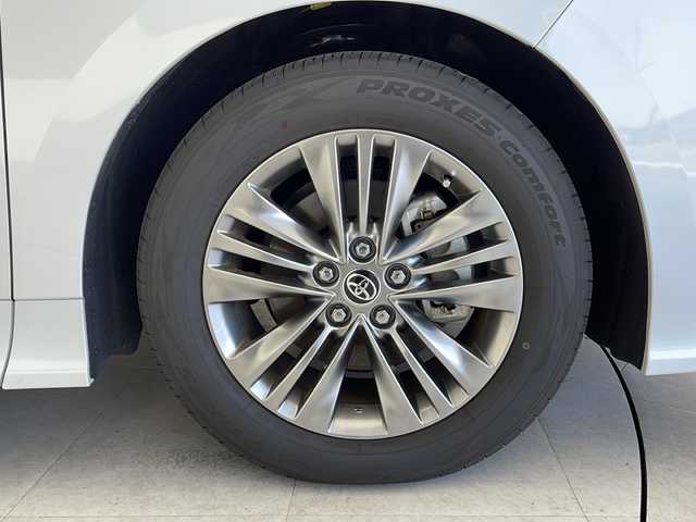 トヨタ アルファードハイブリット Z 愛知県 2024(令6)年 0.4万km プラチナホワイトパールマイカ 衝突軽減システム/純正１４型ディスプレイオーディオ（ナビあり）/フリップダウンモニター/三眼LEDヘッドライト/全方位カメラ/両側パワースライドドア/レーダークルーズコントロール/シートヒーター/エアシート/フルセグ/Bluetooth/バックカメラ/電動リアゲート/パワーシート/ヘッドアップディスプレイ/コーナーセンサー/純正アルミホイール/ＥＴＣ２．０/ブラインドスポットモニター/ステアリングヒーター/インテリジェントミラー/リアオートエアコン/オートマチックハイビーム/置くだけ充電器/ステアリングスイッチ/スマートキー/プッシュスタート