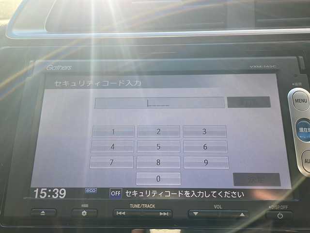 ホンダ フィット 13G Fパッケージ 道央・札幌 2014(平26)年 9.4万km プレミアムホワイトパール 純正ナビ/バックカメラ/ETC/オートライト/アイドリングストップ/電動格納ミラー/純正マット/横滑り防止