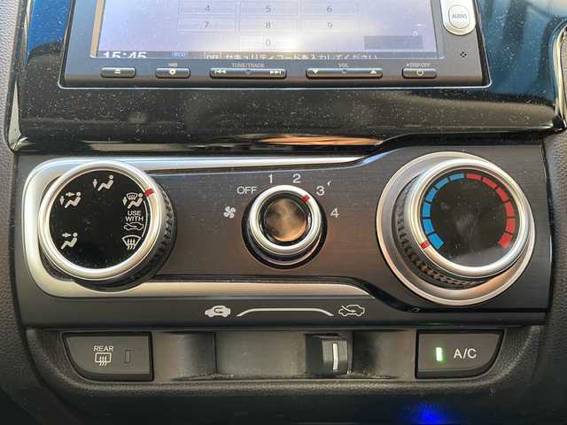 ホンダ フィット 13G Fパッケージ 道央・札幌 2014(平26)年 9.4万km プレミアムホワイトパール 純正ナビ/バックカメラ/ETC/オートライト/アイドリングストップ/電動格納ミラー/純正マット/横滑り防止