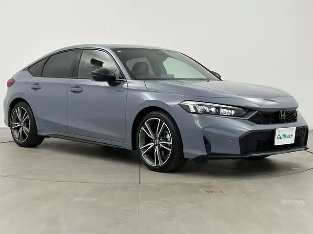 ホンダ シビック e:HEV EX 愛知県 2025(令7)年 0.1千km ソニックグレーパール 登録済未使用車/登録時走行距離13km/パノラマサンルーフ/BOSEサウンドシステム/ホンダコネクト9インチディスプレイ/フルセグTV/Bluetooth/AppleCarPlay/USB/ワイヤレス充電/純正フロアマット/ビルトインETC2.0/純正前後ドライブレコーダー/前席パワーシート/前席シートヒーター/バックカメラ/ホンダセンシング/衝突軽減ブレーキ/パーキングセンサー/踏み間違い防止装置/車線逸脱警報/アダプティブクルーズコントロール/ブラインドスポットモニター/ラゲッジマット/トノカバー