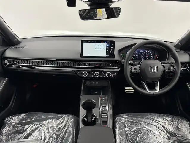 ホンダ シビック e:HEV EX 愛知県 2025(令7)年 0.1千km ソニックグレーパール 登録済未使用車/登録時走行距離13km/パノラマサンルーフ/BOSEサウンドシステム/ホンダコネクト9インチディスプレイ/フルセグTV/Bluetooth/AppleCarPlay/USB/ワイヤレス充電/純正フロアマット/ビルトインETC2.0/純正前後ドライブレコーダー/前席パワーシート/前席シートヒーター/バックカメラ/ホンダセンシング/衝突軽減ブレーキ/パーキングセンサー/踏み間違い防止装置/車線逸脱警報/アダプティブクルーズコントロール/ブラインドスポットモニター/ラゲッジマット/トノカバー
