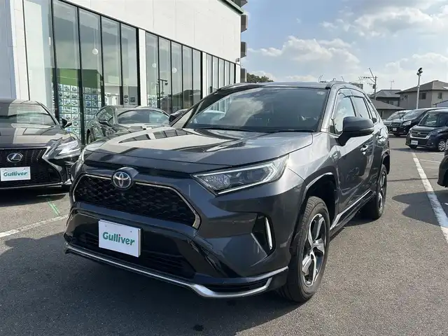 トヨタ ＲＡＶ４ ＰＨＶ G Z 長崎県 2021(令3)年 7.4万km グレーメタリック 純正ディスプレイオーディオ（ナビ/ＡＭ／ＦＭ／フルセグ／ＢＴ）/パノラミックビューモニター/ブラインドスポットモニター/ビルトインETC/レーダークルーズコントロール/全席シートヒーター/前席エアシート/ステアリングヒーター/ステアリングスイッチ/パワーバックドア/パワーシート前席/純正18インチアルミホイール