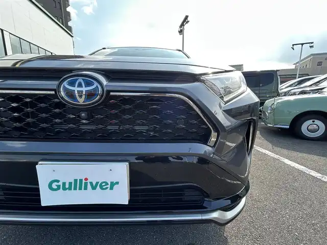 トヨタ ＲＡＶ４ ＰＨＶ G Z 長崎県 2021(令3)年 7.4万km グレーメタリック 純正ディスプレイオーディオ（ナビ/ＡＭ／ＦＭ／フルセグ／ＢＴ）/パノラミックビューモニター/ブラインドスポットモニター/ビルトインETC/レーダークルーズコントロール/全席シートヒーター/前席エアシート/ステアリングヒーター/ステアリングスイッチ/パワーバックドア/パワーシート前席/純正18インチアルミホイール