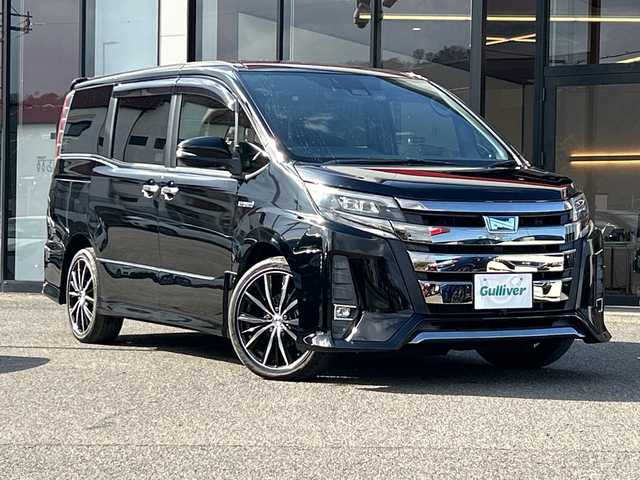 トヨタ ノア ハイブリッド Si ダブルバイビー 大阪府 2018(平30)年 5.1万km ブラック トヨタセーフティセンス　純正１０型ナビ　フリップダウンモニター　バックカメラ　両側パワースライドドア　前席シートヒーター　ハーフレザーシート　クルーズコントロール　前後ドラレコ　ＥＴＣ　ＬＥＤオートライト　ＣＤ　ＤＶＤ　ＢＴ　フルセグTV
