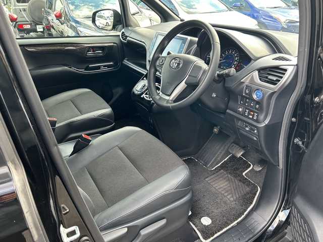 トヨタ ノア ハイブリッド Si ダブルバイビー 大阪府 2018(平30)年 5.1万km ブラック トヨタセーフティセンス　純正１０型ナビ　フリップダウンモニター　バックカメラ　両側パワースライドドア　前席シートヒーター　ハーフレザーシート　クルーズコントロール　前後ドラレコ　ＥＴＣ　ＬＥＤオートライト　ＣＤ　ＤＶＤ　ＢＴ　フルセグTV