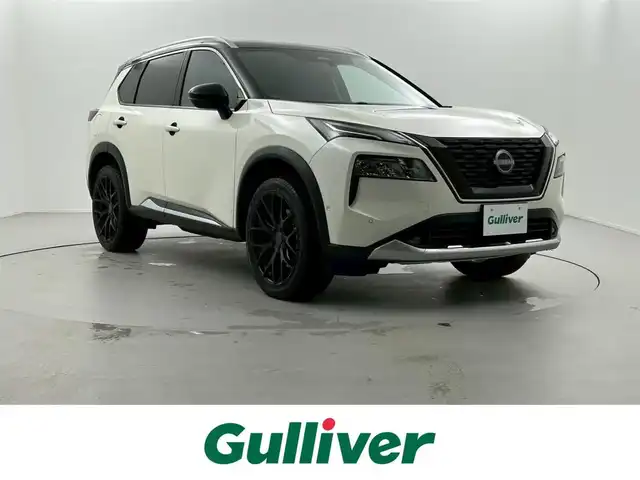 日産 エクストレイル G e－4ORCE 福井県 2023(令5)年 1.5万km ブリリアントホワイトパール/スーパーブラック 2トーン 純正メーカーオプションナビ/・全方位カメラ/・Bluetooth接続/・アップルカープレイ　/・アンドロイドオート/・フルセグTV/・USB入力端子/２．０プロパイロット/ＲＡＹＳ２０インチアルミホイール/レザーシート/シートヒーター（運転席＆助手席）/パワーシート　（運転席＆助手席）/純正ビルトインＥＴＣ２．０/電動リアゲート　/ヘッドアップディスプレイ/ニスモドアハンドルプロテクター/純正フロアマット