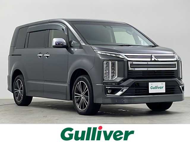 三菱 デリカＤ：５ アーバンギア G パワーパッケージ 千葉県 2019(令1)年 5.1万km アイガーグレーメタリック 純正10インチナビ/CD＆DVD＆BT＆USB＆フルセグTV/11/5インチ後席モニター/FCM/LDW/BSM/レーダークルーズコントロール/ビルトインETC/アラウンドビューモニター/パドルシフト/運転席・助手席シートヒーター/電動パーキングブレーキ（オートホールド付き）/両側パワースライドドア/純正フロアマット/純正ドアバイザー/純正18インチアルミホイール/LEDヘッドライト（オートライト付き）/LEDフォグライト/アイドリングストップ/ウィンカーミラー/プッシュスタート