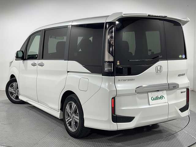 ホンダ ステップワゴン スパーダ eHEV G ホンダS 広島県 2020(令2)年 5.2万km プラチナホワイトパール 純正10型ナビ/純正フリップダウンモニター/マルチビューカメラ/スマートパーキングアシスト/両側パワースライドドア/ホンダセンシング/・衝突軽減ブレーキ/・レーンキープアシスト/・アダプティブクルーズコントロール/・誤発進抑制機能/ETC2.0/ドライブレコーダー/USB/HDMI入力端子