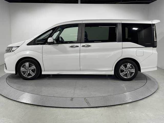 ホンダ ステップワゴン スパーダ eHEV G ホンダS 広島県 2020(令2)年 5.2万km プラチナホワイトパール 純正10型ナビ/純正フリップダウンモニター/マルチビューカメラ/スマートパーキングアシスト/両側パワースライドドア/ホンダセンシング/・衝突軽減ブレーキ/・レーンキープアシスト/・アダプティブクルーズコントロール/・誤発進抑制機能/ETC2.0/ドライブレコーダー/USB/HDMI入力端子