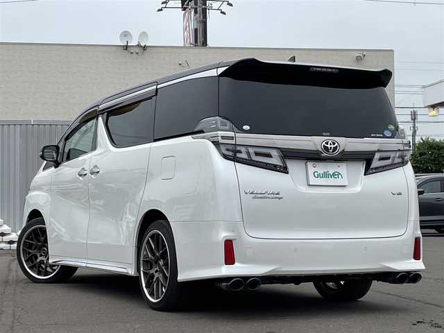 トヨタ ヴェルファイア エグゼクティブ ラウンジ Z 道東・釧路十勝 2019(令1)年 2.8万km ホワイトパールクリスタルシャイン 4WD/寒冷地仕様車/Toyota Safety Sense/・PCS(プリクラッシュセーフティ)/・LTA(レーントレーシングアシスト)/・オートマチックハイビーム/・レーダークルーズコントロール/サンルーフ/純正メーカーOPナビ/ (CD/DVD/BT)/フルセグTV/全方位カメラ/JBLプレミアムサウンド/純正フリップダウンモニター/ビルトインETC/両側パワースライドドア/パワーバックドア/ウッドコンビステアリング/ステアリングスイッチ/ステアリングヒーター/レザーシート/キャプテンシート/パワーシート/メモリーシート/シートヒーター/エアーシート/オットマン/プッシュスタート/スマートキー/純正キー1体型エンジンスターター/MAVERCK20インチAW/純正17インチAW付スタッドレスタイヤ積込/オートライト/純正3眼LEDヘッドライト/シーケンシャルウインカー/フォグランプ/ (フロント/リア)/ウインカーミラー/電動格納ミラー/純正フロアマット/横滑り防止装置/取扱説明書/保証書