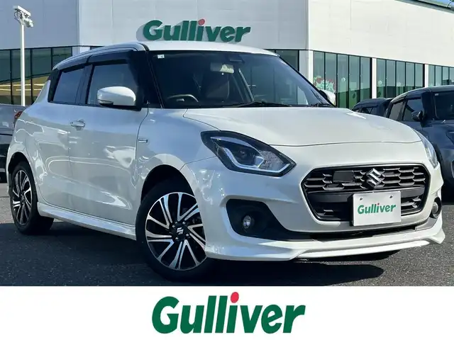 スズキ スイフト HYBRID RS 島根県 2020(令2)年 4.7万km ピュアホワイトP 登録時走行距離47048km/社外ナビ(フルセグTV・Bluetooth・AM・FM)/アイドリングストップ/レーンキープアシスト/横滑り防止装置/衝突軽減ブレーキ/ブラインドスポットモニター/コーナーセンサー/ウィンカーミラー/レーダークルーズコントロール/ドアバイザー/プッシュスタート/ステアリングスイッチ/パドルシフト付き/フォグランプ/オートライト