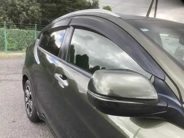 ホンダ ヴェゼル ハイブリッド Z 埼玉県 2014(平26)年 11.9万km ミスティックグリーンパール (株)IDOMが運営する【じしゃロン鳩ヶ谷店】の自社ローン専用車両になりますこちらは現金またはオートローンご利用時の価格です。自社ローンご希望の方は別途その旨お申付け下さい/社外SDナビ(品番:MDV-D407BT)/社外フルセグテレビ/バックカメラ/クルーズコントロール/プッシュスタート/ETC/LEDヘッドライト/純正17インチAW/ハーフレザーシート/スマートキー/パドルシフト/革巻ステアリング/ウインカーミラー/フォグランプ