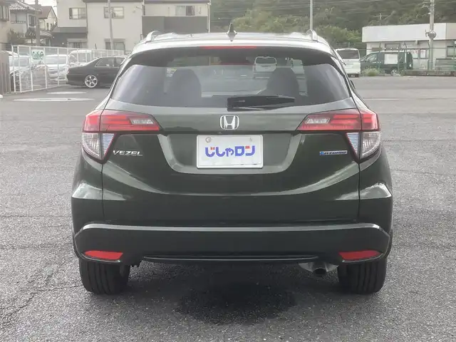 ホンダ ヴェゼル ハイブリッド Z 埼玉県 2014(平26)年 11.9万km ミスティックグリーンパール (株)IDOMが運営する【じしゃロン鳩ヶ谷店】の自社ローン専用車両になりますこちらは現金またはオートローンご利用時の価格です。自社ローンご希望の方は別途その旨お申付け下さい/社外SDナビ(品番:MDV-D407BT)/社外フルセグテレビ/バックカメラ/クルーズコントロール/プッシュスタート/ETC/LEDヘッドライト/純正17インチAW/ハーフレザーシート/スマートキー/パドルシフト/革巻ステアリング/ウインカーミラー/フォグランプ