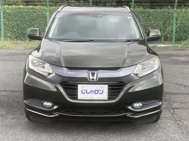 ホンダ ヴェゼル ハイブリッド Z 埼玉県 2014(平26)年 11.9万km ミスティックグリーンパール (株)IDOMが運営する【じしゃロン鳩ヶ谷店】の自社ローン専用車両になりますこちらは現金またはオートローンご利用時の価格です。自社ローンご希望の方は別途その旨お申付け下さい/社外SDナビ(品番:MDV-D407BT)/社外フルセグテレビ/バックカメラ/クルーズコントロール/プッシュスタート/ETC/LEDヘッドライト/純正17インチAW/ハーフレザーシート/スマートキー/パドルシフト/革巻ステアリング/ウインカーミラー/フォグランプ