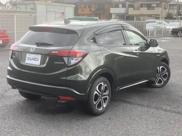 ホンダ ヴェゼル ハイブリッド Z 埼玉県 2014(平26)年 11.9万km ミスティックグリーンパール (株)IDOMが運営する【じしゃロン鳩ヶ谷店】の自社ローン専用車両になりますこちらは現金またはオートローンご利用時の価格です。自社ローンご希望の方は別途その旨お申付け下さい/社外SDナビ(品番:MDV-D407BT)/社外フルセグテレビ/バックカメラ/クルーズコントロール/プッシュスタート/ETC/LEDヘッドライト/純正17インチAW/ハーフレザーシート/スマートキー/パドルシフト/革巻ステアリング/ウインカーミラー/フォグランプ