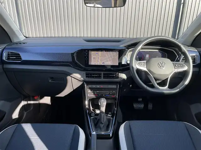 フォルクスワーゲン ＶＷ Ｔ－クロス TSI スタイル 福島県 2022(令4)年 1.4万km ディープブラックパールエフェクト デザインパッケージ/・専用コンビシート/・専用18インチAW/・専用ダッシュパッド/・専用ドアミラー/アダプティブクルーズコントロール/レーンキープ/ブラインドスポット/デジタルメーター/純正ナビ/バックカメラ/AppleCarPlay/ETC/LEDオートライト/パドルシフト/前後ドライブレコーダー/コーナーセンサー/スマートキー/取扱説明書/スペアキー